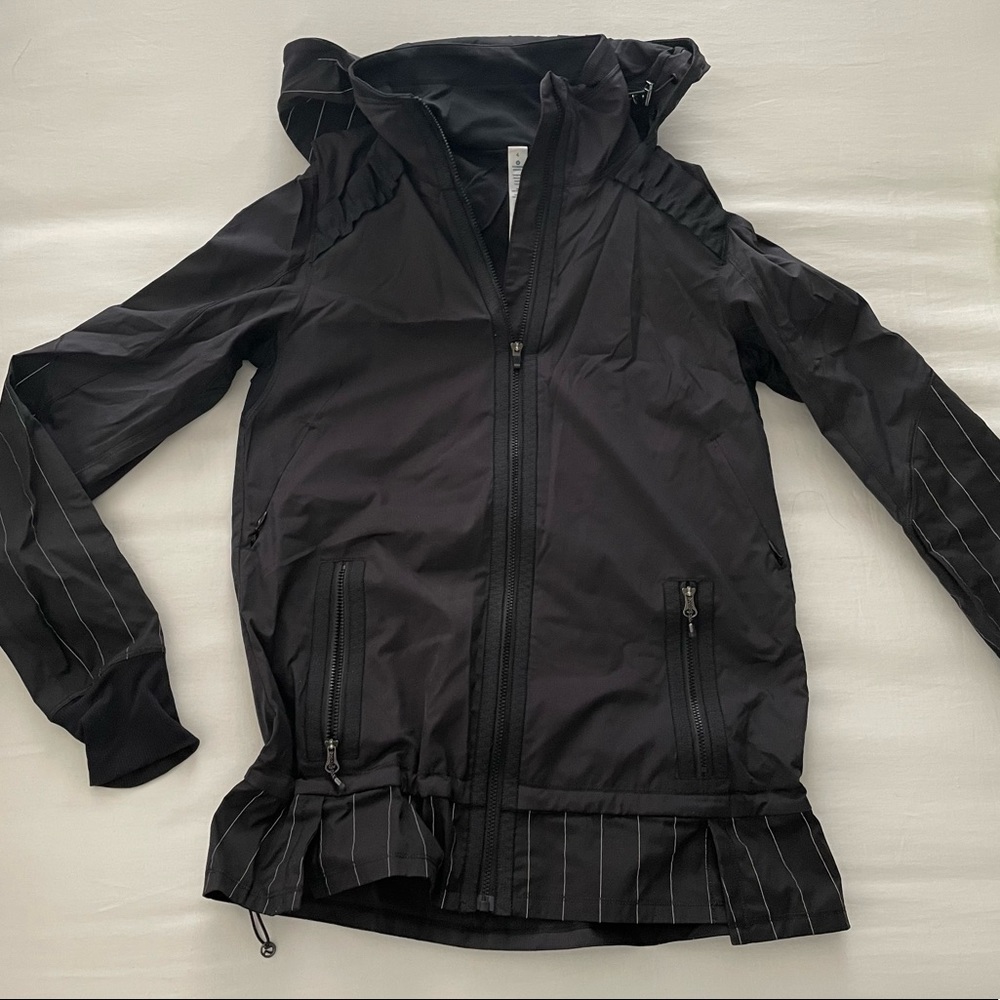 Lululemon light jacket, ruffle detail by collar & pinstripes. Removable hood